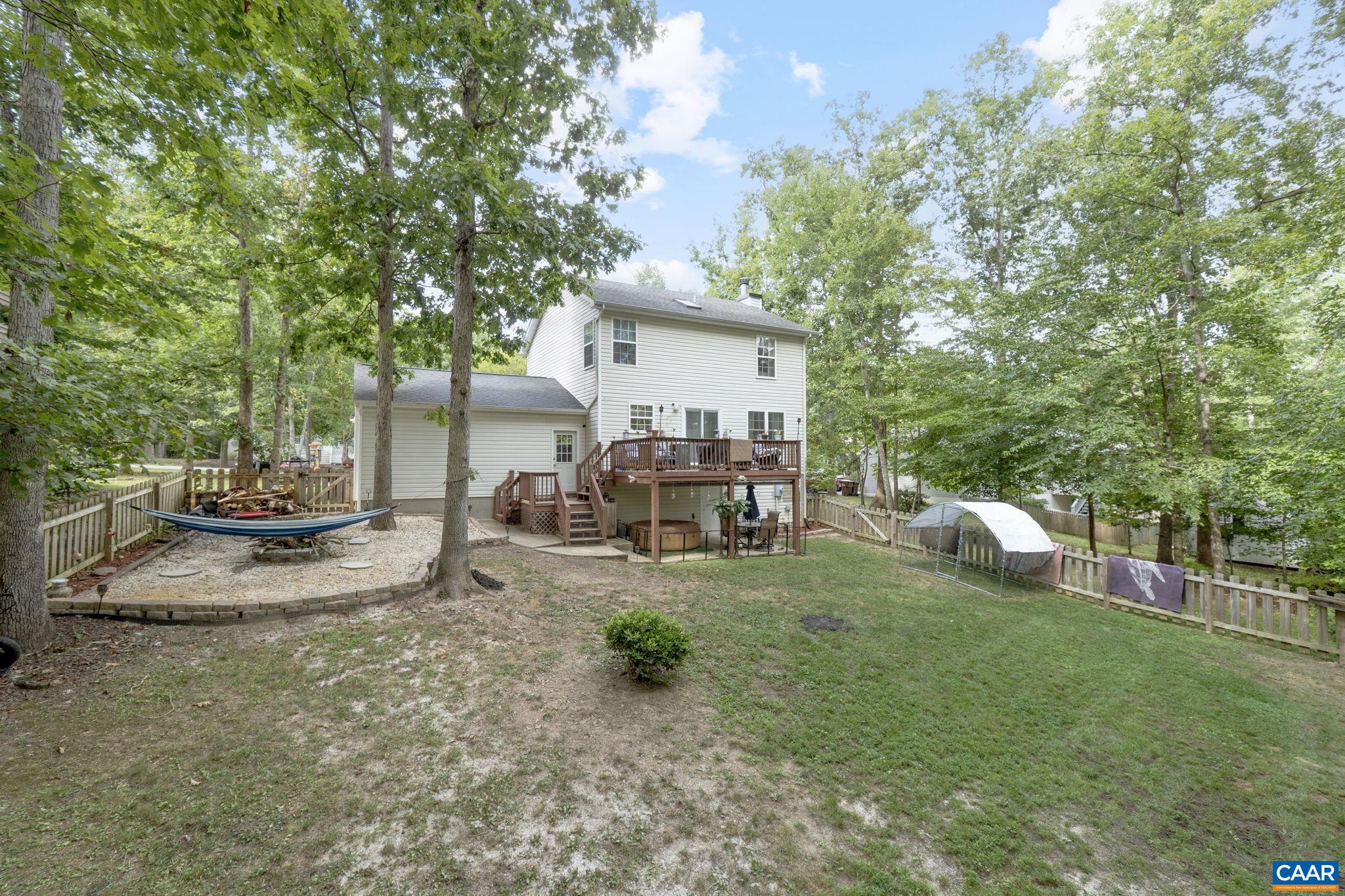 89 Riverside Drive Palmyra, VA 22963 - Photo 3 of 38 a view of a house with backyard porch and sitting area