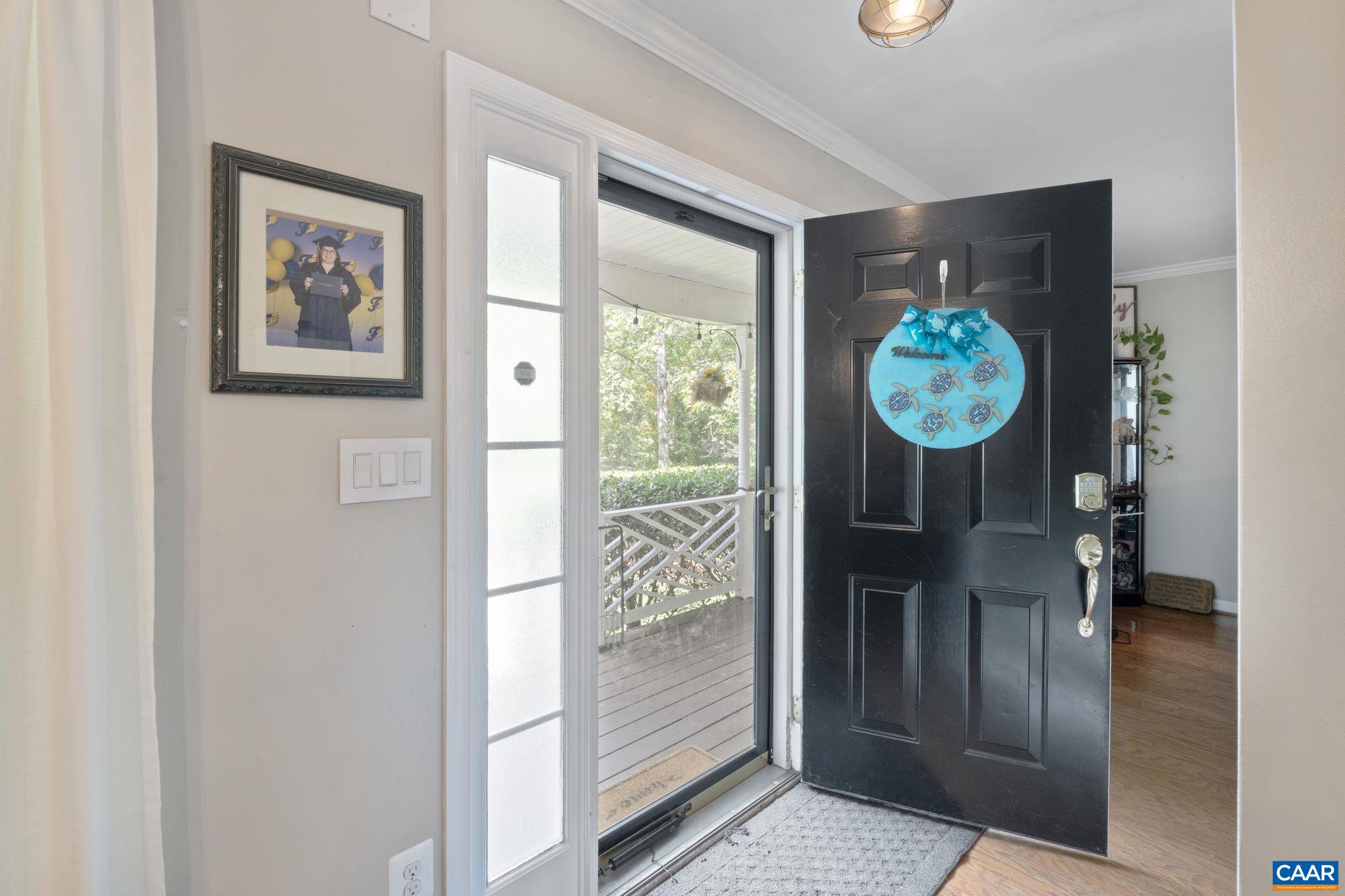 89 Riverside Drive Palmyra, VA 22963 - Photo 8 of 47 a view of an entryway with wooden floor