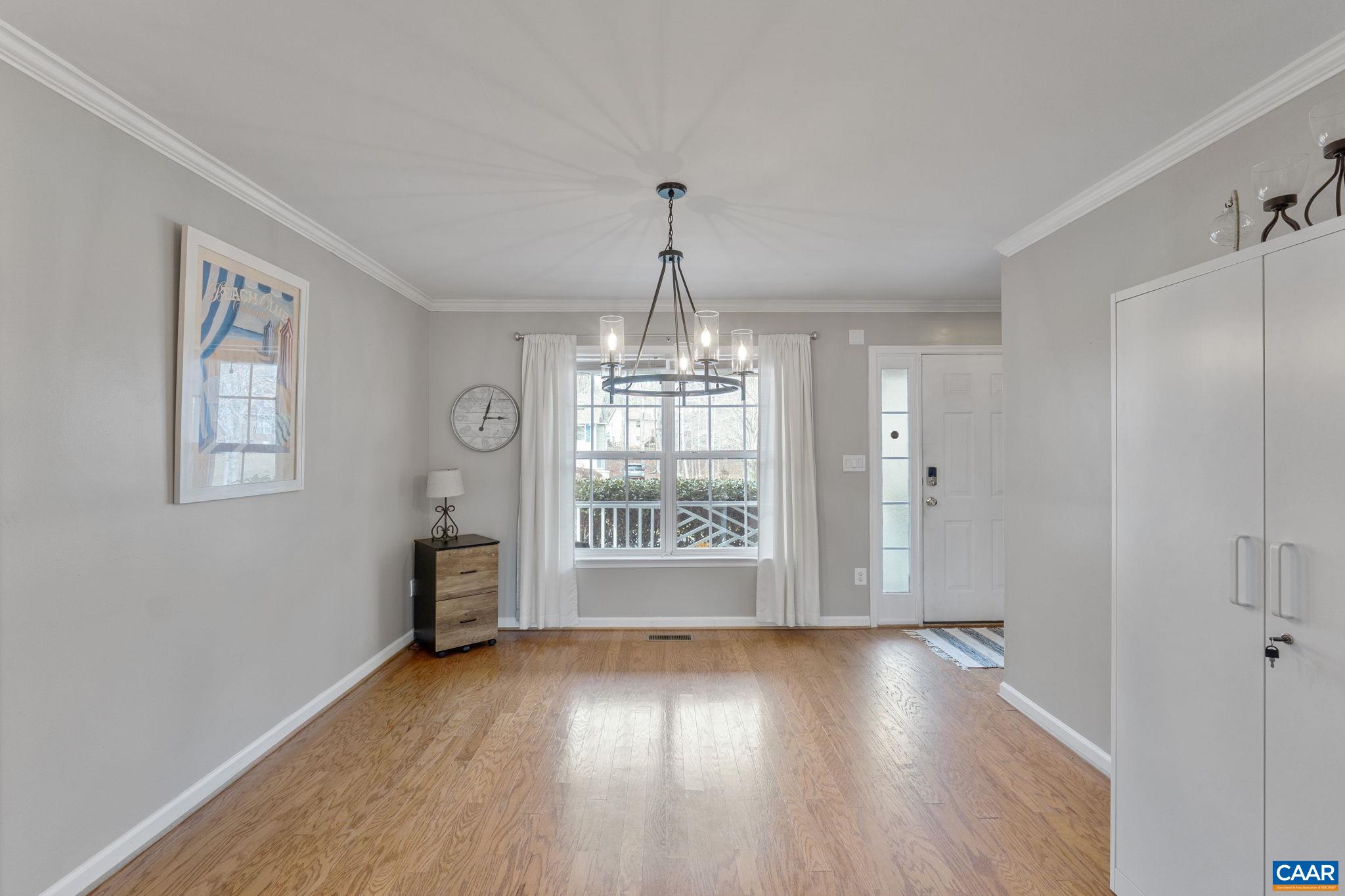 89 Riverside Drive Palmyra, VA 22963 - Photo 10 of 38 a view of an empty room with wooden floor and a window