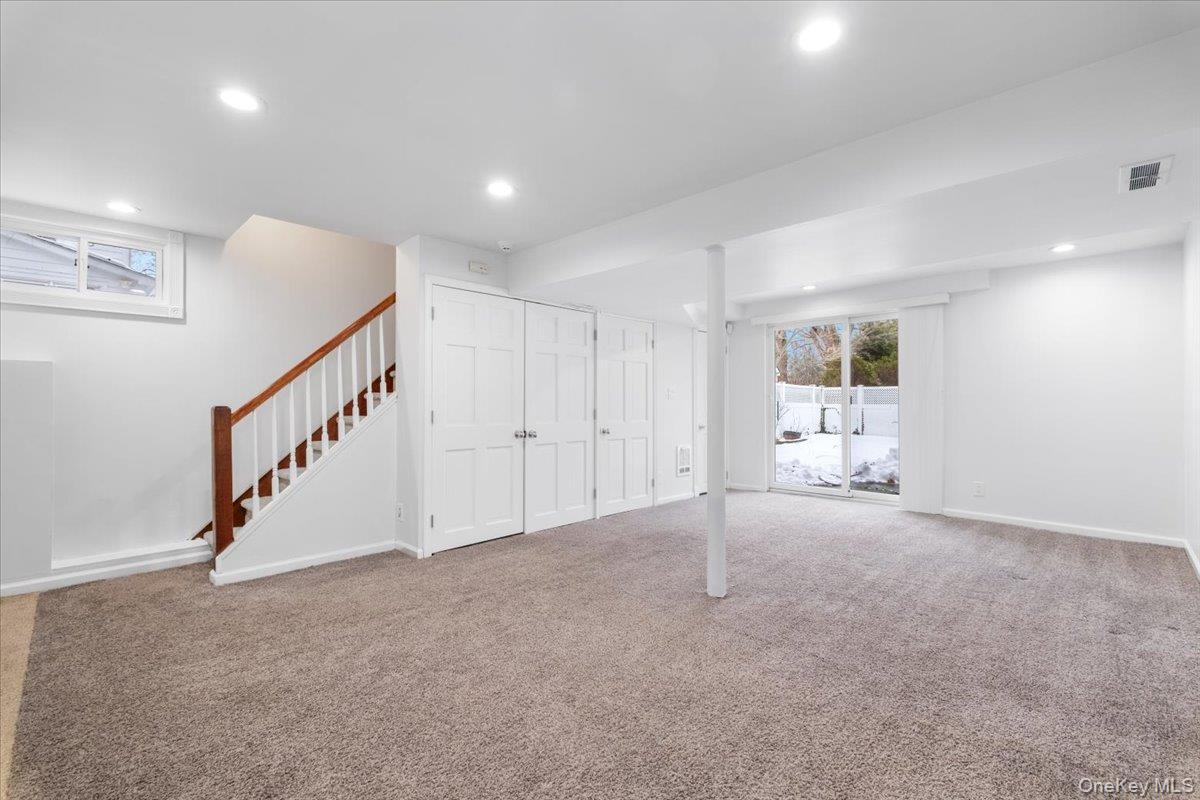 182 Madison Road Scarsdale, NY 10583 - Photo 23 of 30 a view of an empty room with stairs