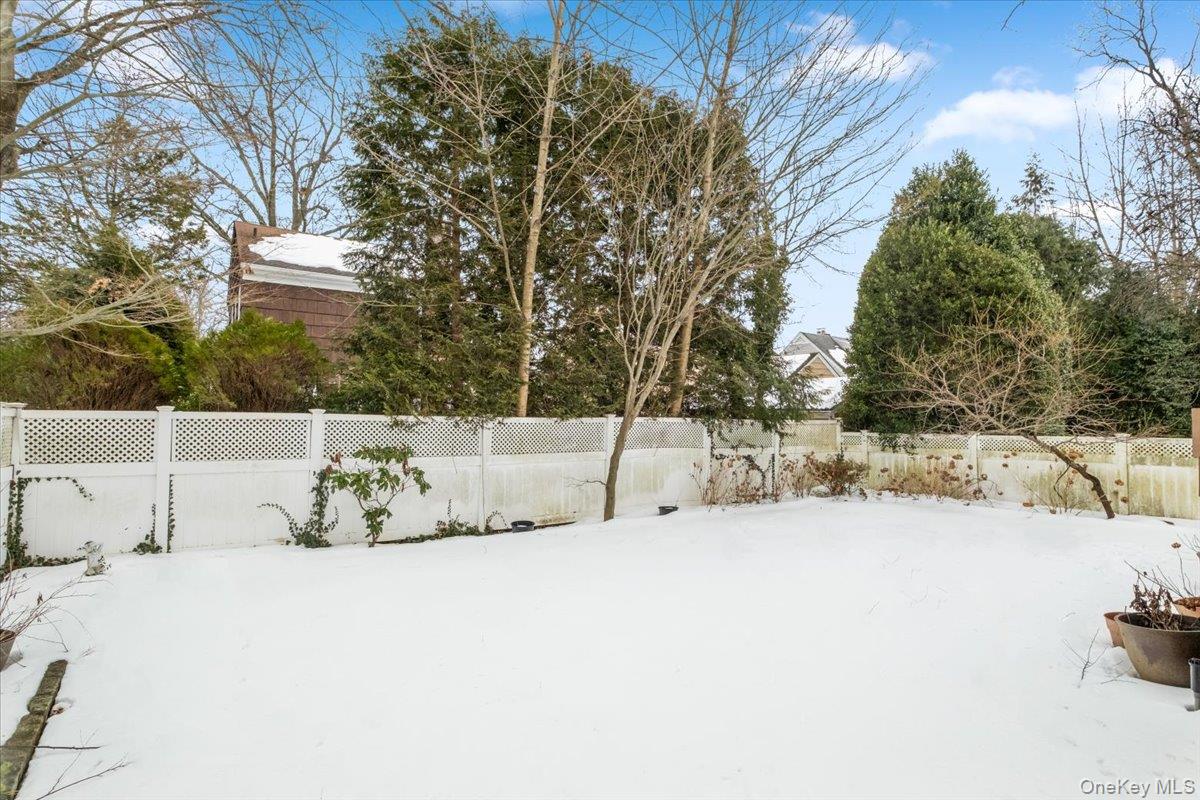 182 Madison Road Scarsdale, NY 10583 - Photo 27 of 30 a view of a snow with trees