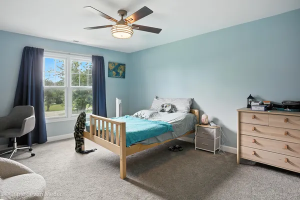 a view of a livingroom with storage and utility