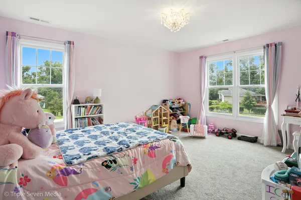 a bedroom with a bed and closet