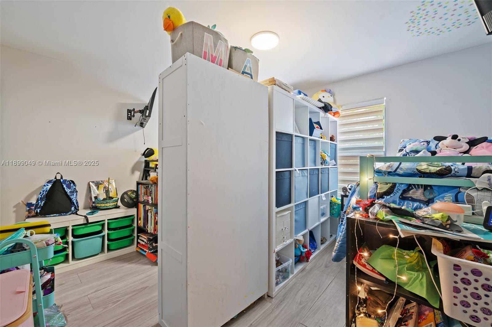 10923 Southwest 134th Court Miami, FL 33186 - Photo 17 of 28 a room with storage and utility