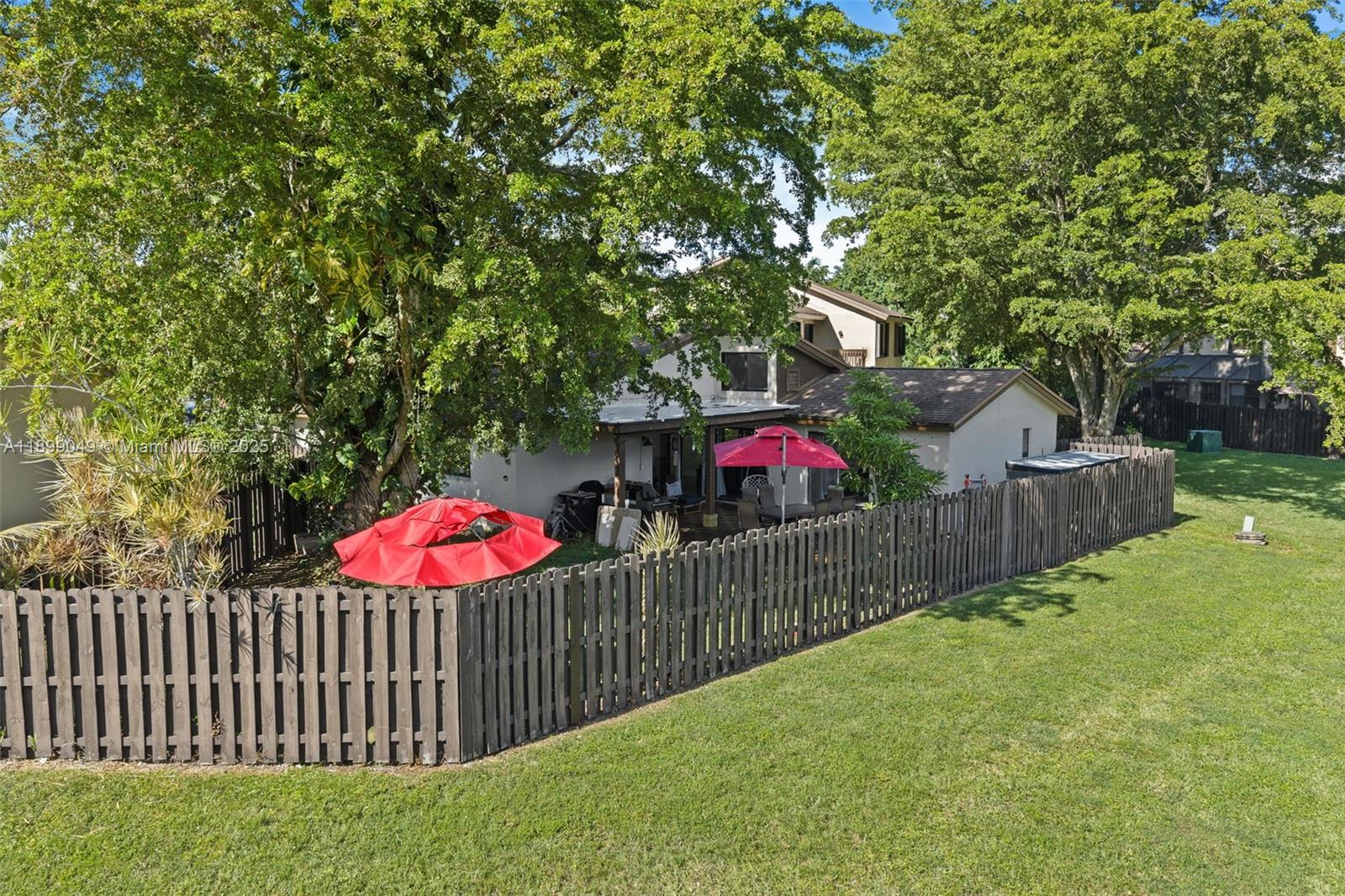 10923 Southwest 134th Court Miami, FL 33186 - Photo 23 of 28 a view of a porch and garden