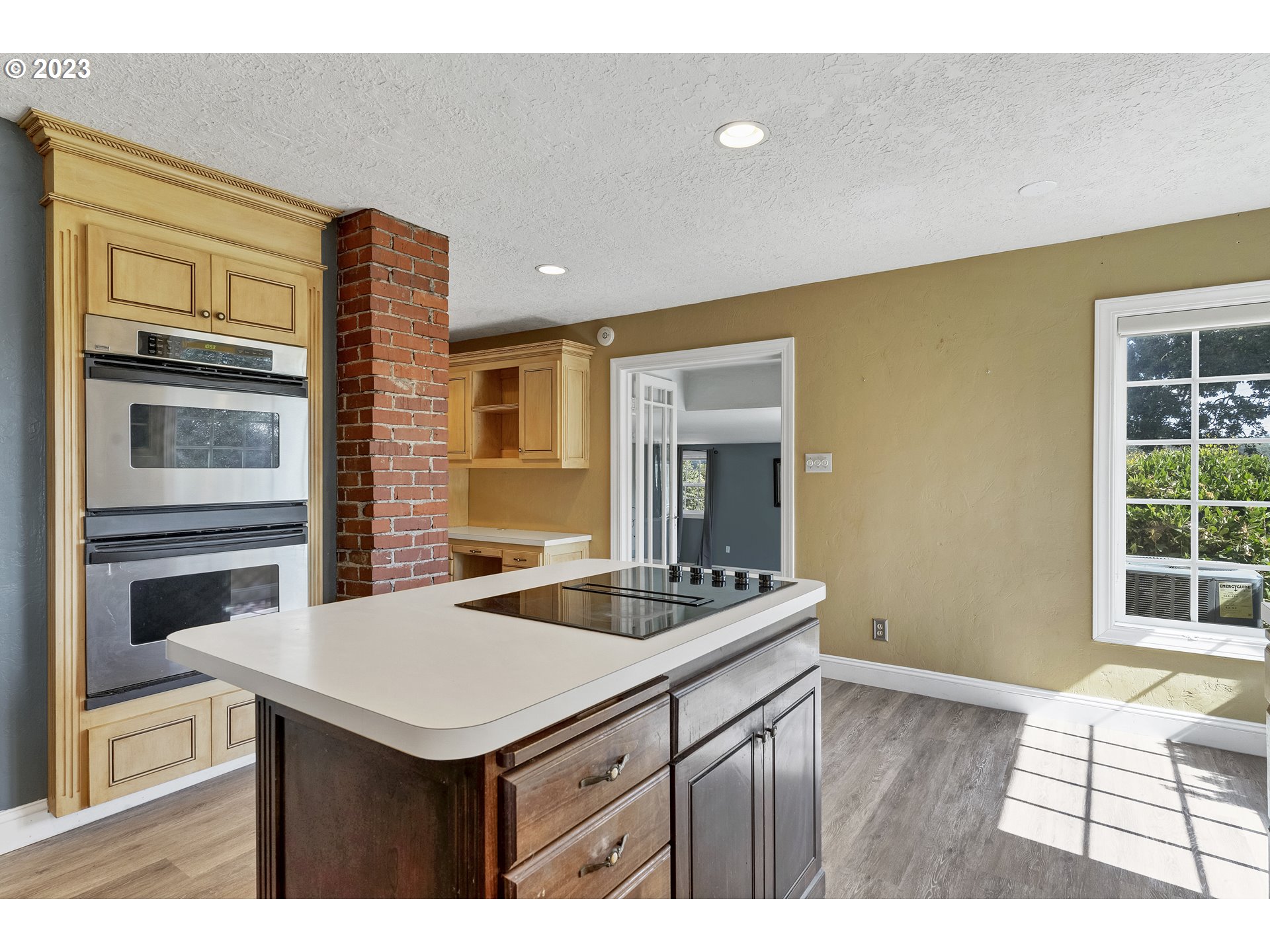 8455 Wallace Road Northwest Salem, OR 97304 - Photo 10 of 43 a kitchen that has a sink and a stove