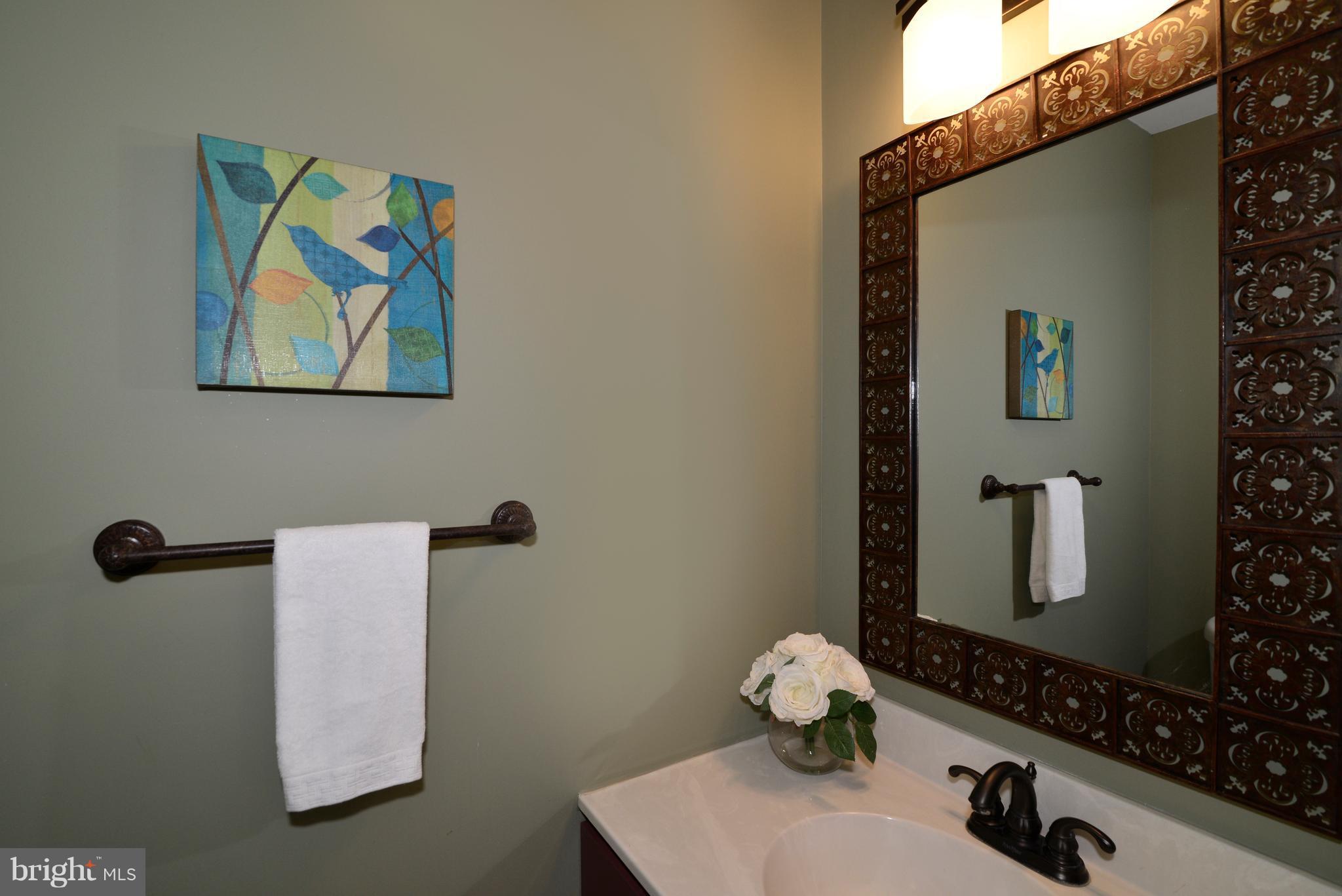 11230 Beaver Trail Court, Unit 4 Reston, VA 20191 - Photo 10 of 22 The main level has an updated powder room.