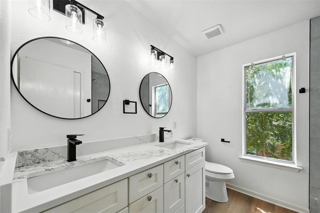6218 Everglade Road Dallas, TX 75227 - Photo 21 of 39 Bathroom with wood finished floors and double vanity