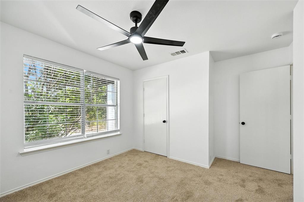 6218 Everglade Road Dallas, TX 75227 - Photo 26 of 39 Unfurnished bedroom with light carpet and a ceiling fan