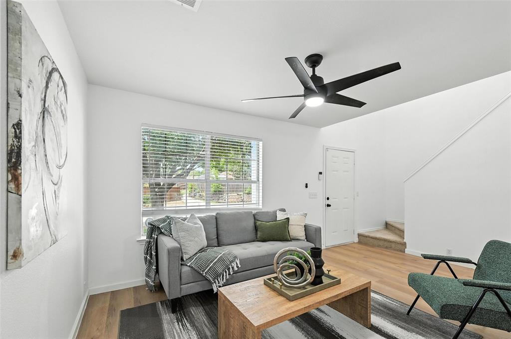 6218 Everglade Road Dallas, TX 75227 - Photo 3 of 39 Living room featuring wood finished floors, ceiling fan, and stairs