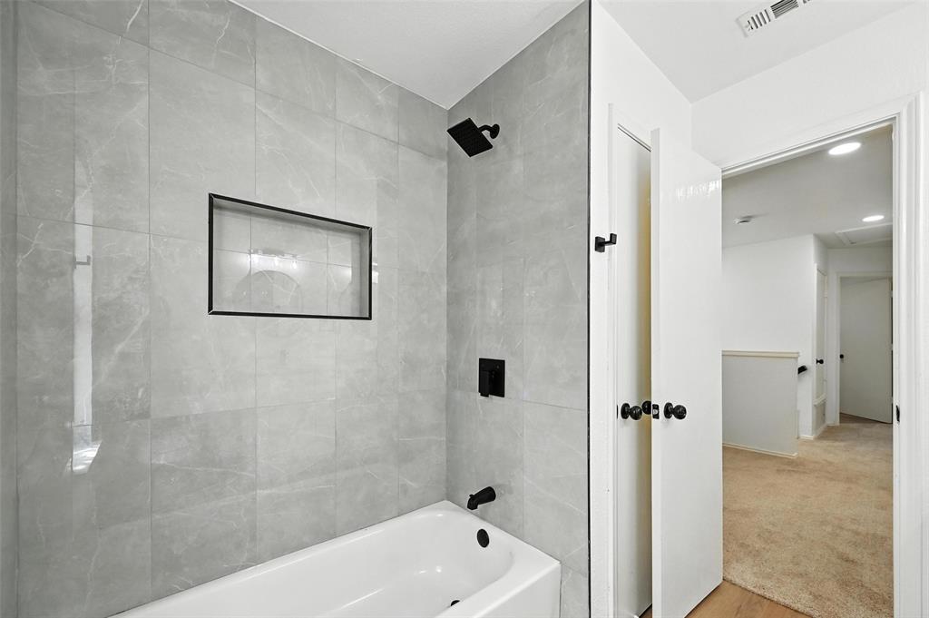 6218 Everglade Road Dallas, TX 75227 - Photo 33 of 39 Full bath featuring shower / tub combination