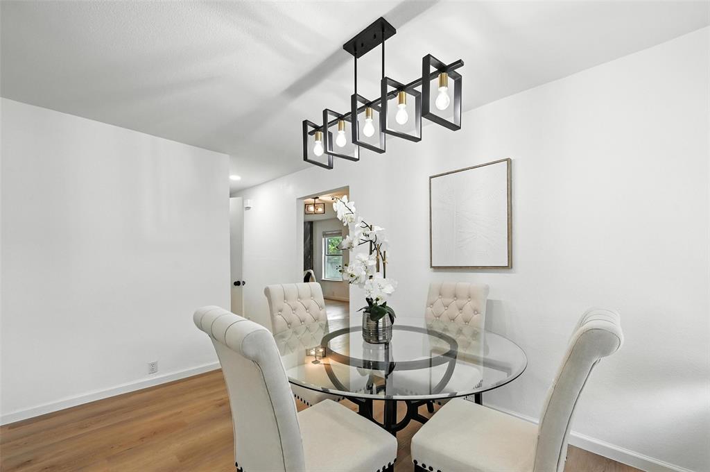 6218 Everglade Road Dallas, TX 75227 - Photo 5 of 39 Dining area with wood finished floors