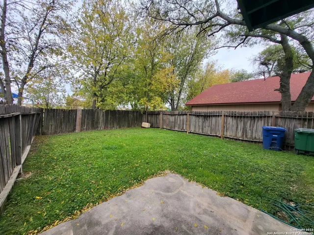 a view of a backyard with a garden