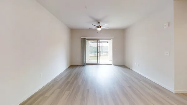 a kitchen with a table and chairs in it