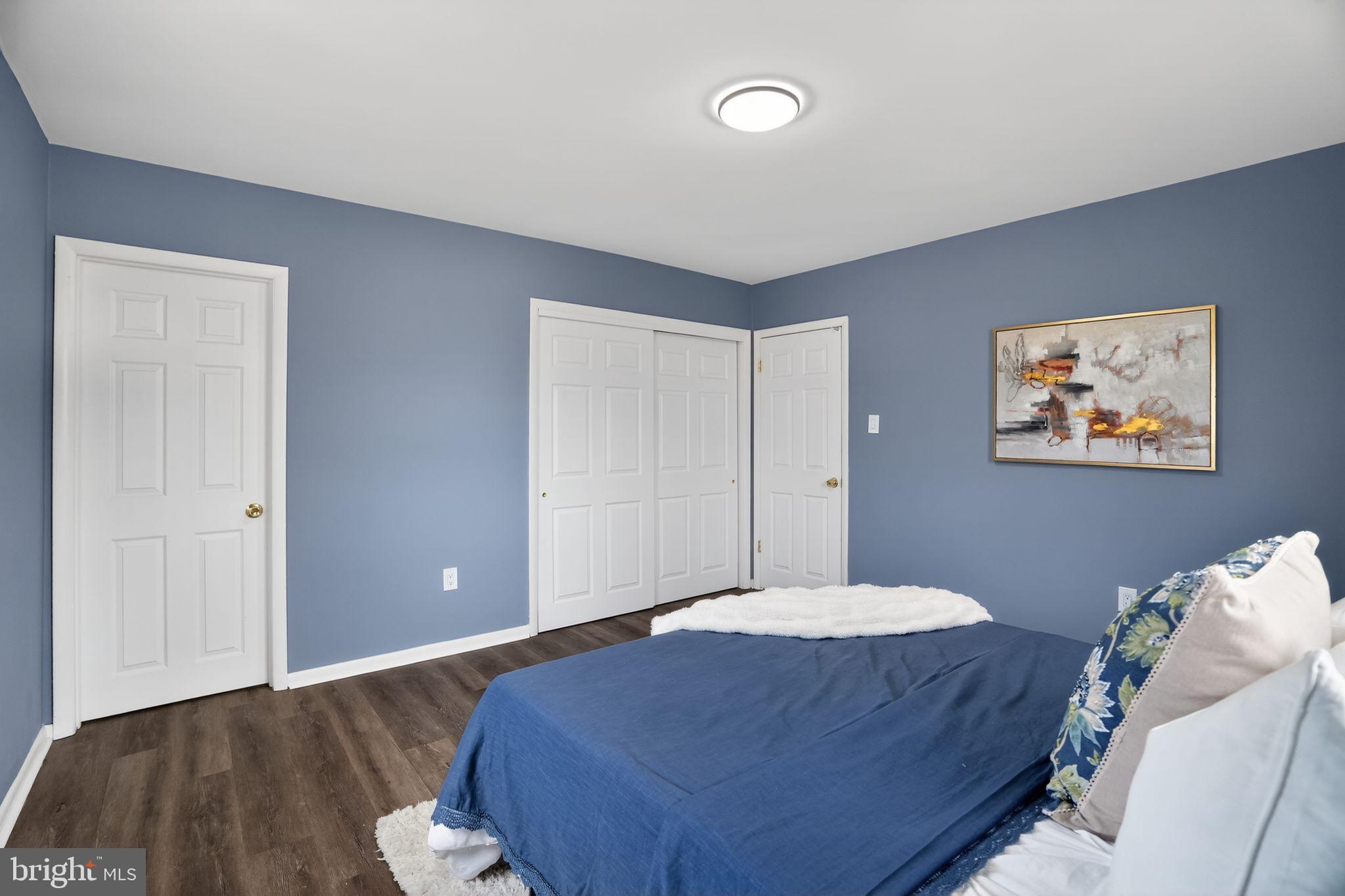 218 East Somerdale Road Somerdale, NJ 08083 - Photo 18 of 30 a bedroom with a bed and a painting on the wall