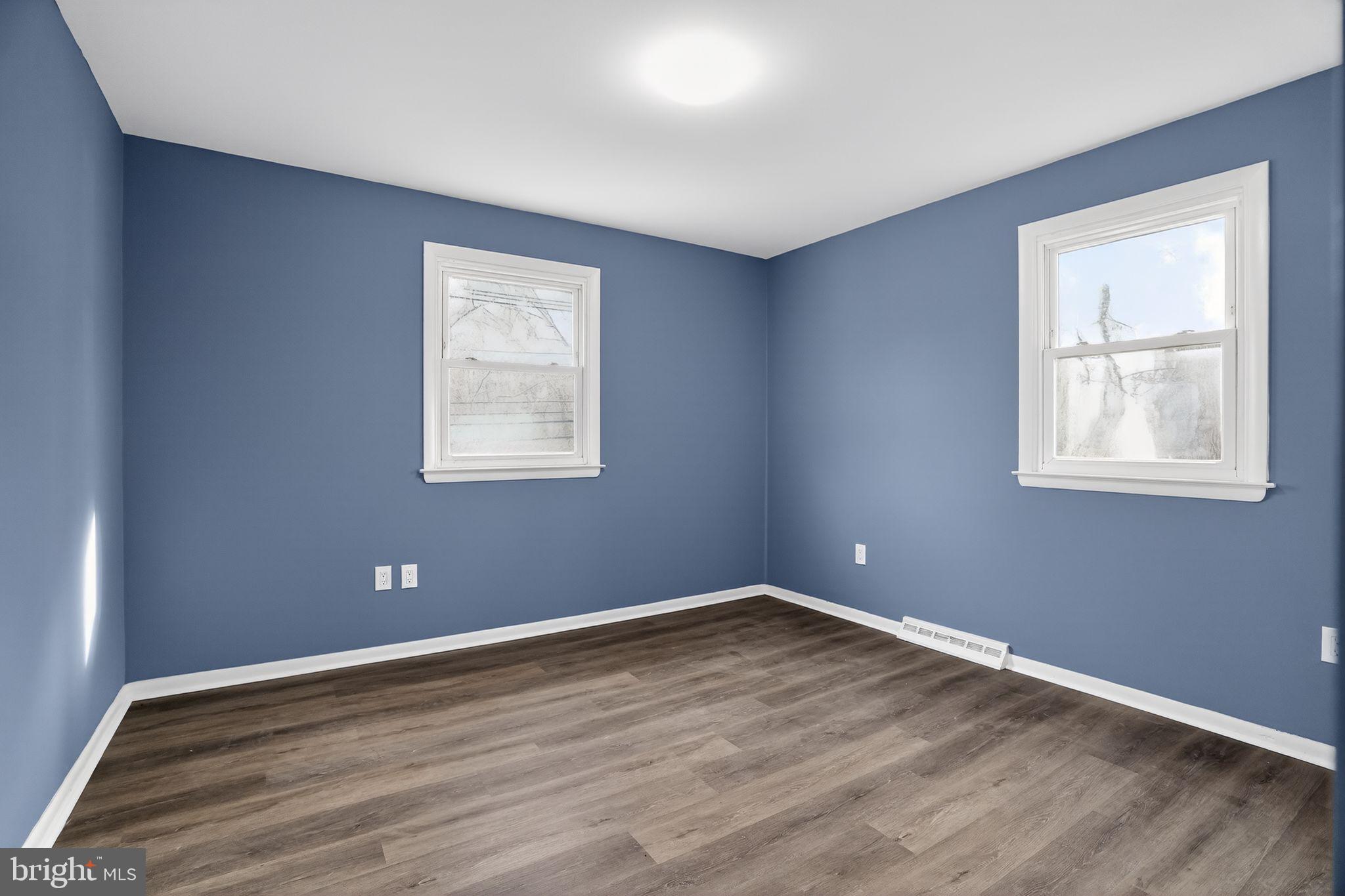 218 East Somerdale Road Somerdale, NJ 08083 - Photo 24 of 30 a view of a big room with wooden floor and windows