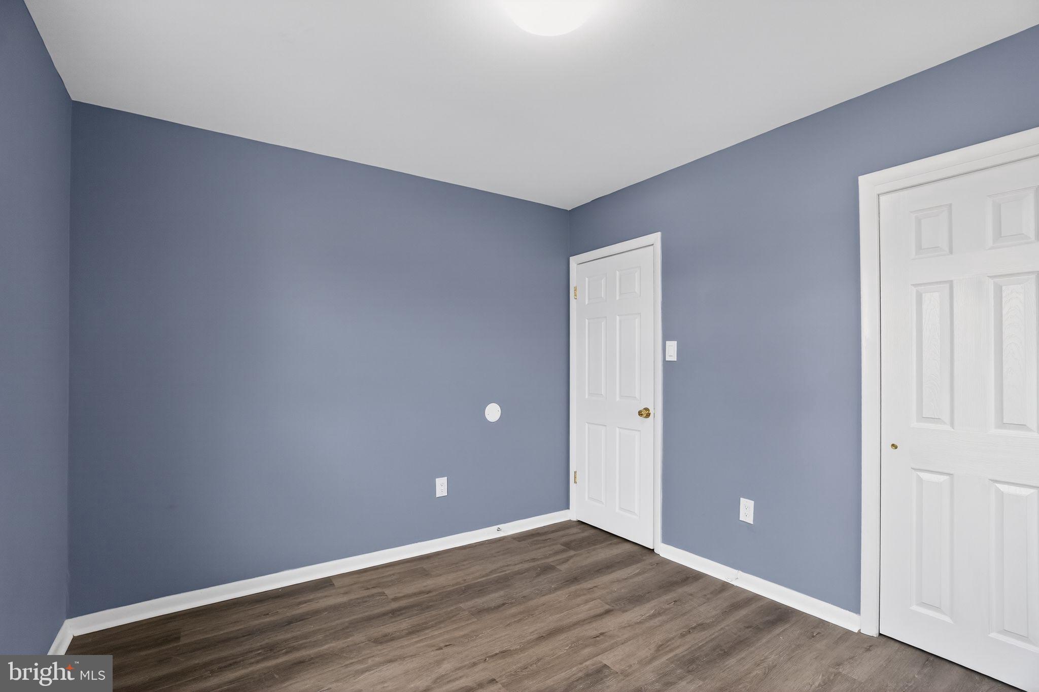 218 East Somerdale Road Somerdale, NJ 08083 - Photo 26 of 30 a view of an empty room with wooden floor