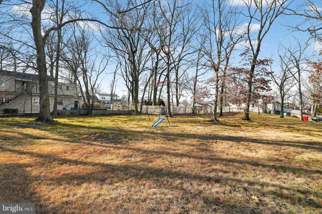 a view of a swimming pool with an outdoor space