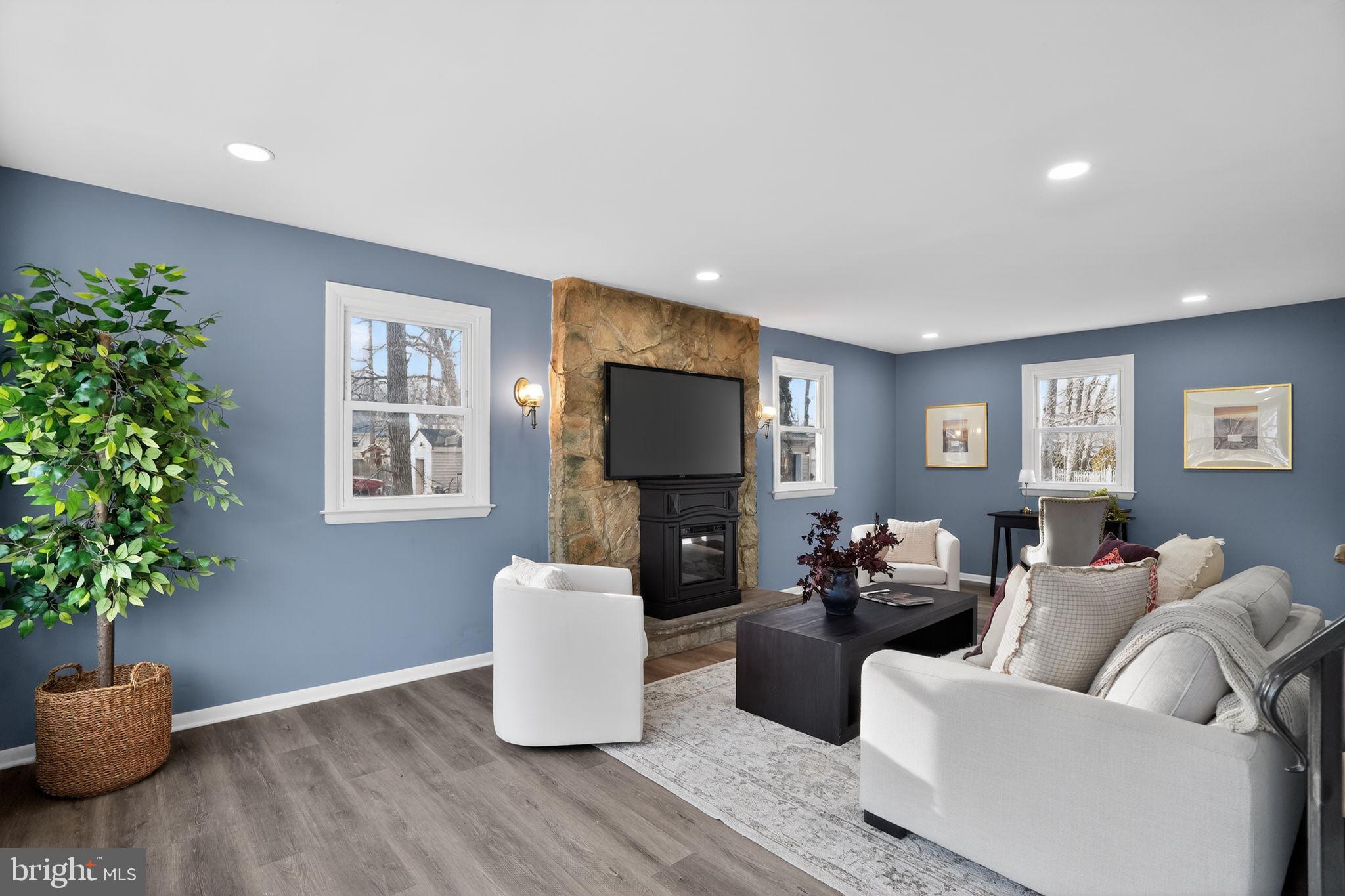218 East Somerdale Road Somerdale, NJ 08083 - Photo 5 of 30 a living room with furniture and a potted plant