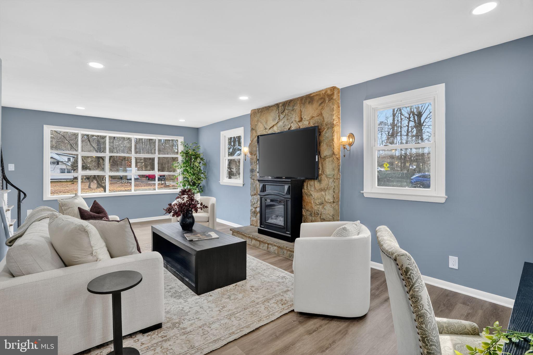 218 East Somerdale Road Somerdale, NJ 08083 - Photo 6 of 30 a living room with furniture and a flat screen tv
