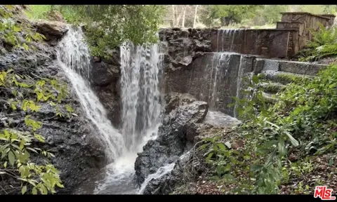 a room with lots of furniture and clutter