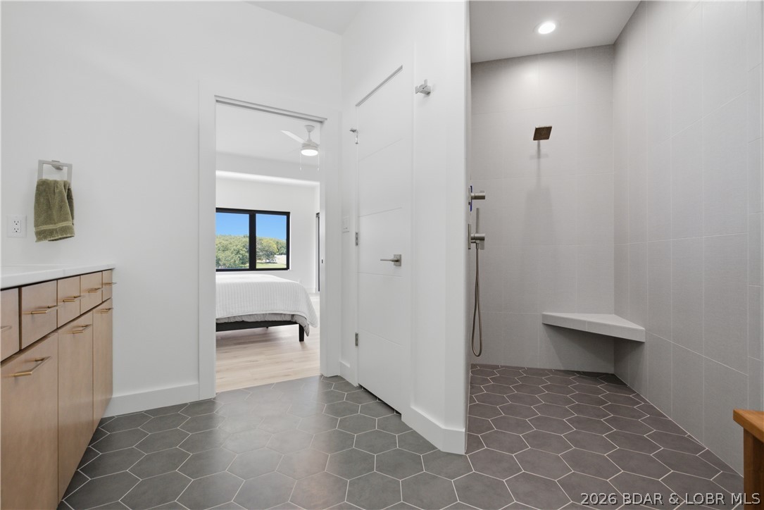 1175 Oak Road Osage Beach, MO 65065 - Photo 22 of 38 The primary bathroom features a walk-in shower and