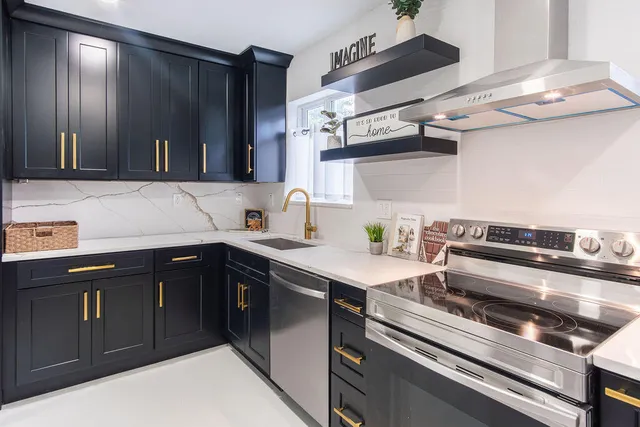 an empty room with windows and closet