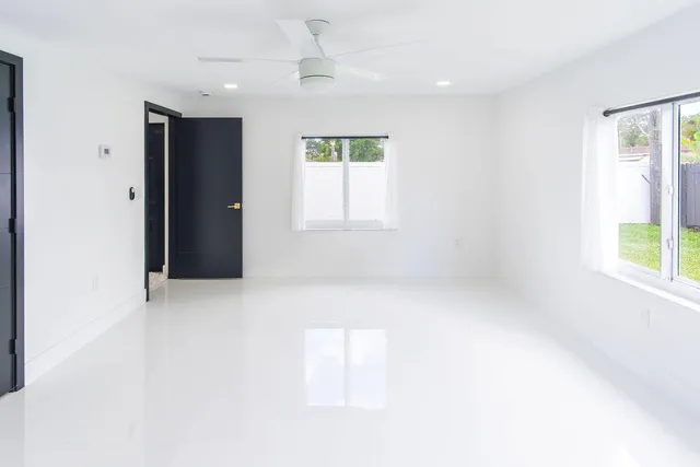 an empty room with windows