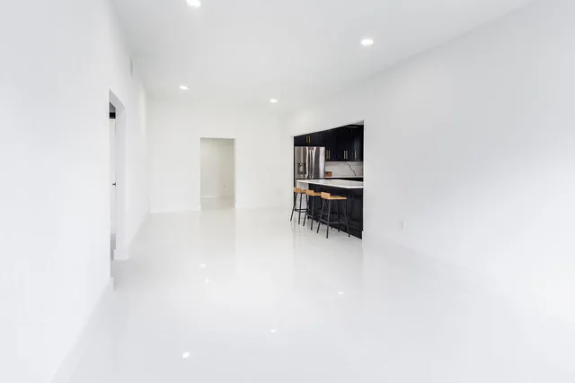 a view of a living room and dining room