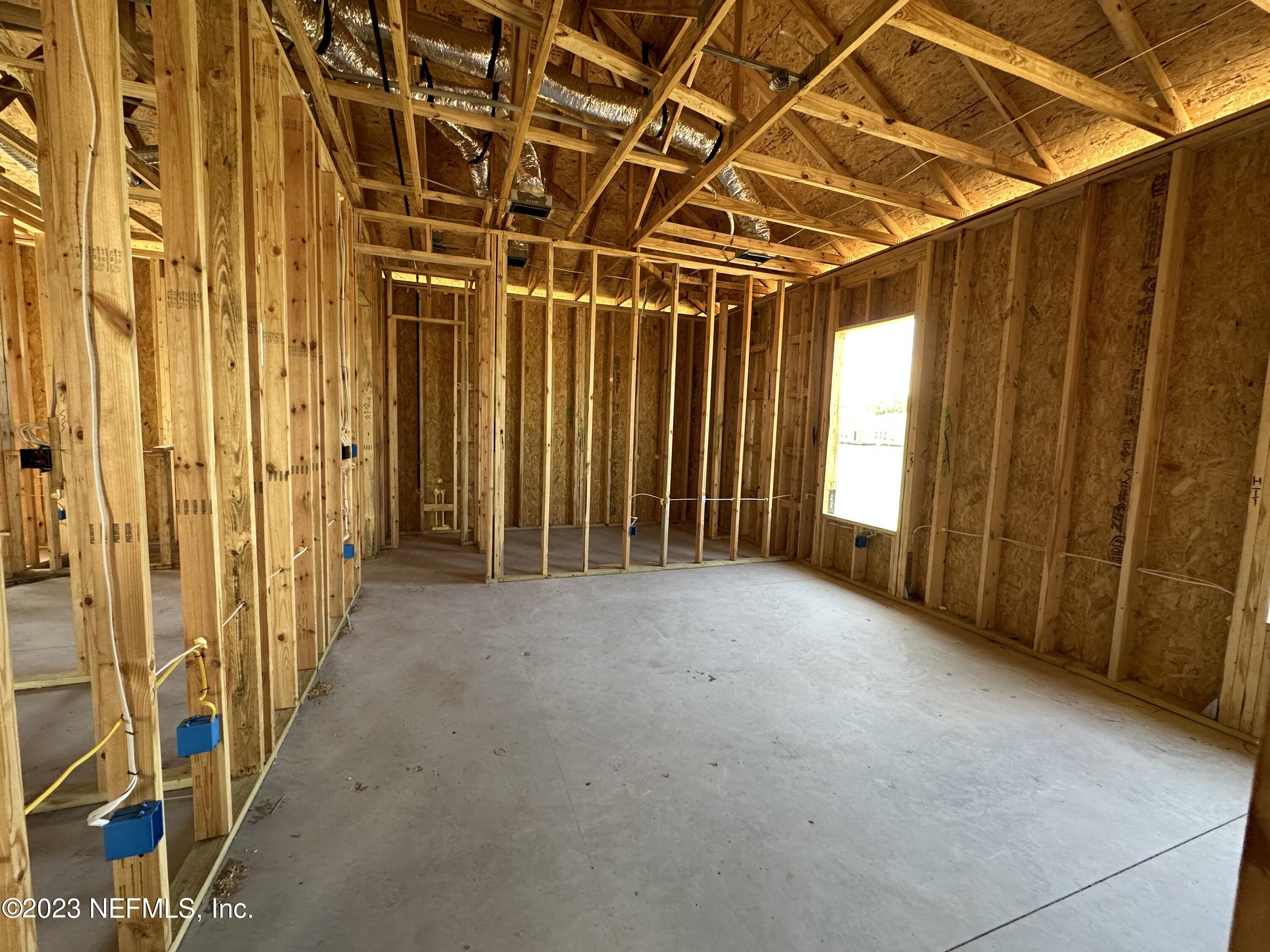 68 Amarante Lane St. Augustine, FL 32095 - Photo 11 of 31 a view of a room with wooden walls
