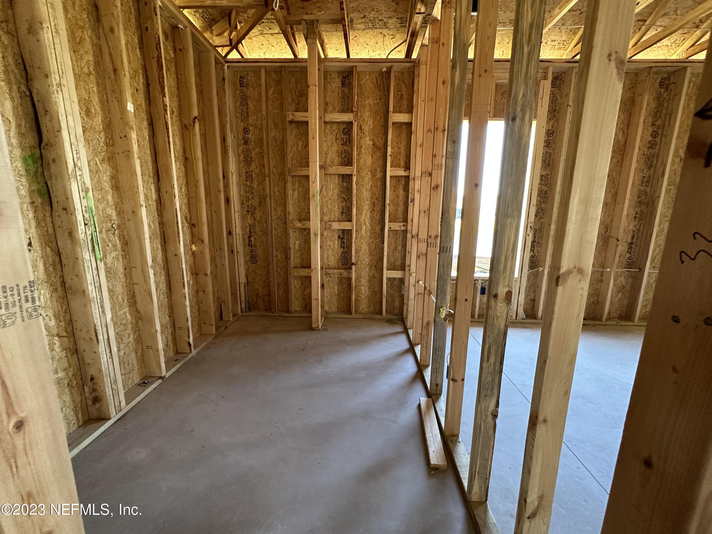 68 Amarante Lane St. Augustine, FL 32095 - Photo 13 of 31 a view of a bathroom with shower and curtain