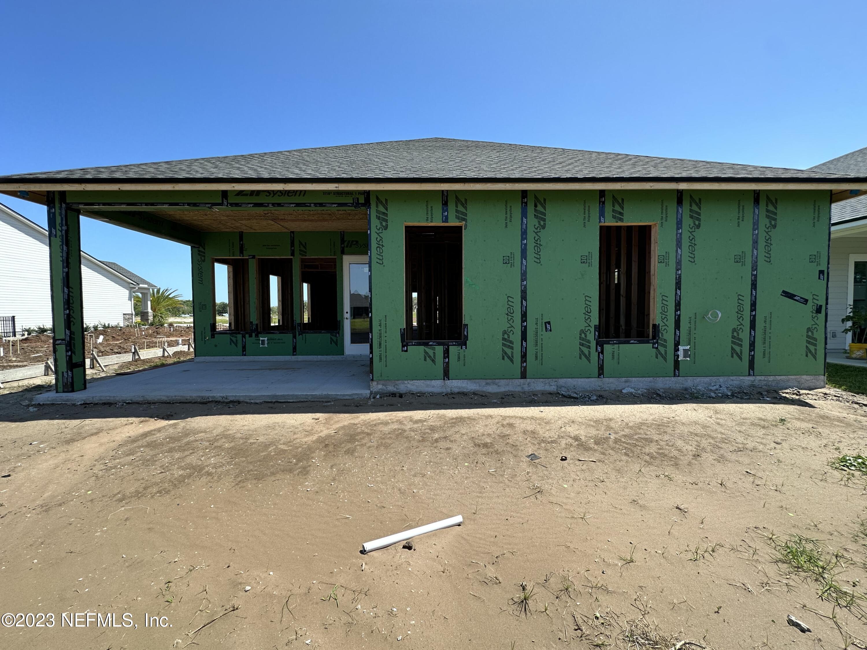 68 Amarante Lane St. Augustine, FL 32095 - Photo 3 of 31 front view of a house with a small yard