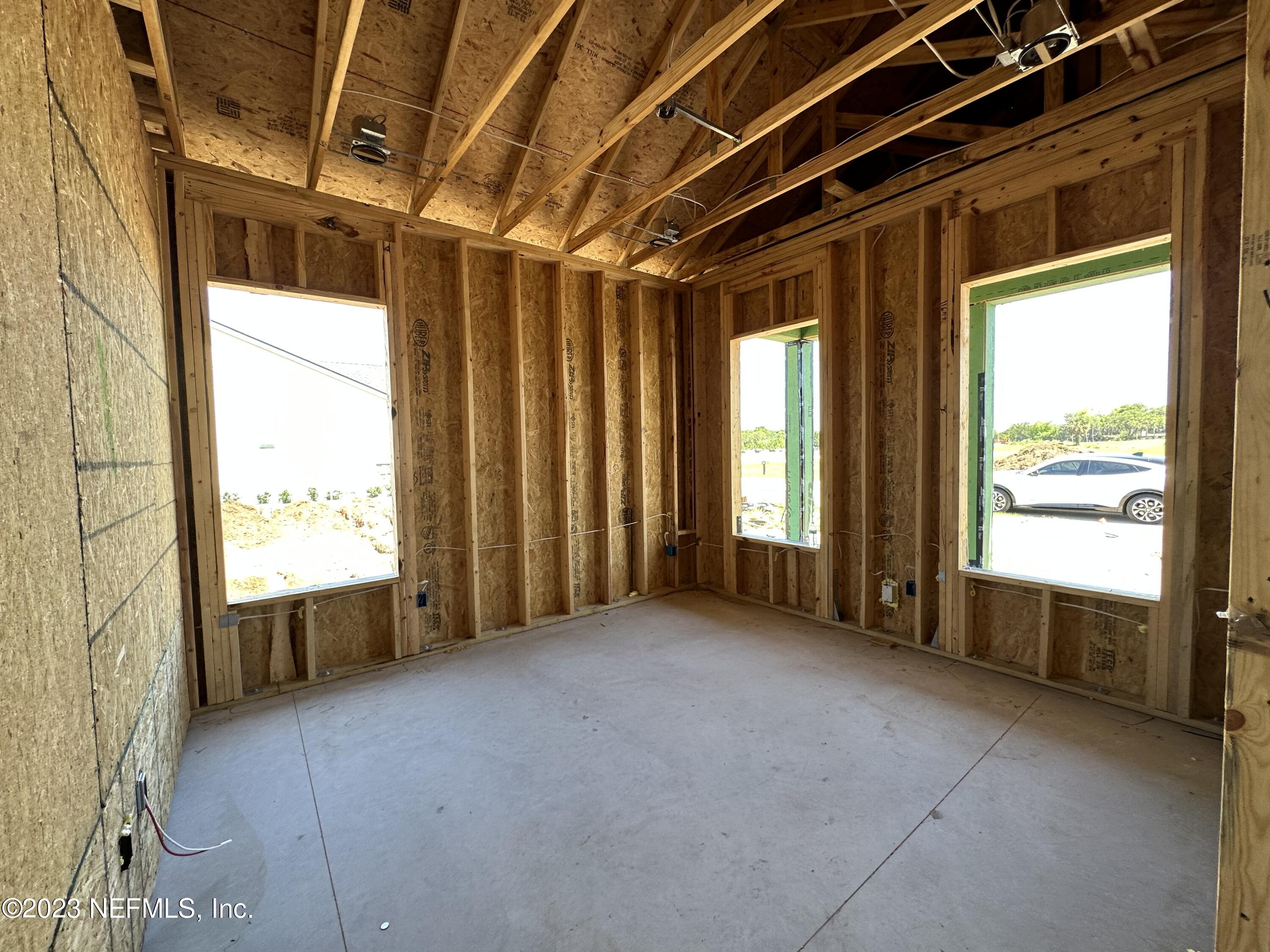 68 Amarante Lane St. Augustine, FL 32095 - Photo 5 of 31 a view of an empty room with a window