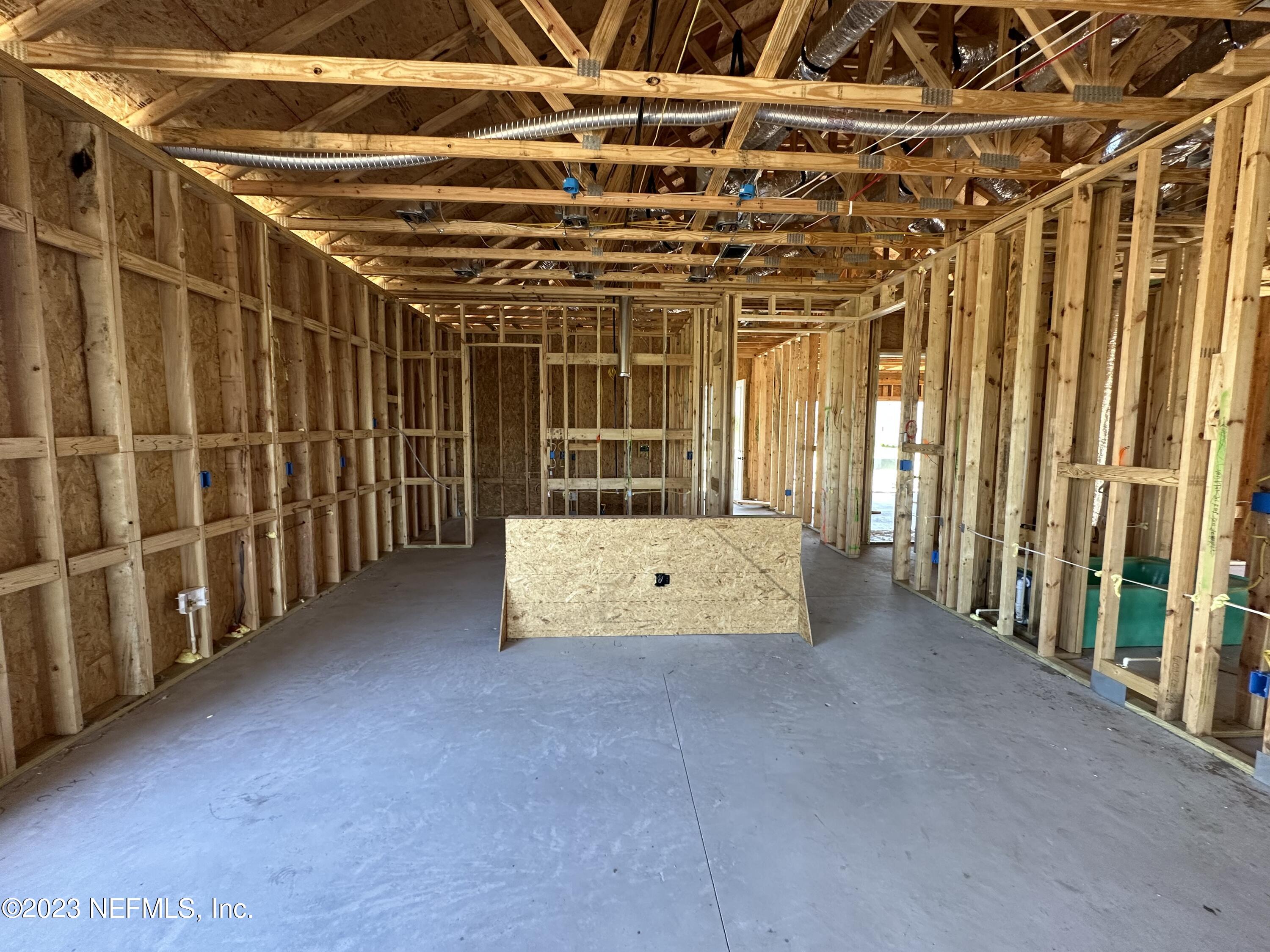 68 Amarante Lane St. Augustine, FL 32095 - Photo 10 of 31 a view of a room with wooden walls