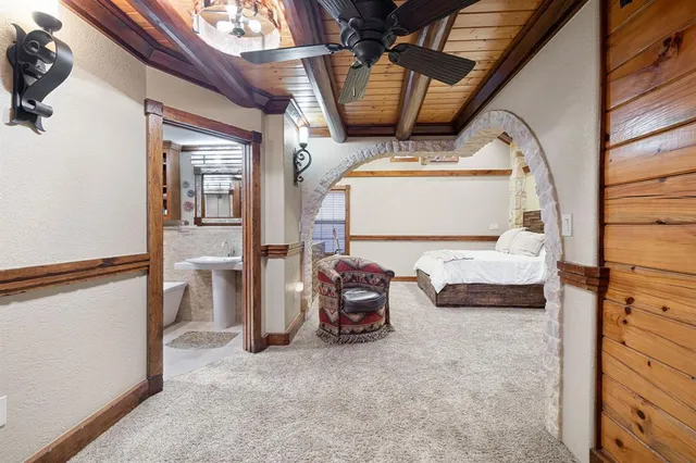 a view of living room with furniture and a chandelier