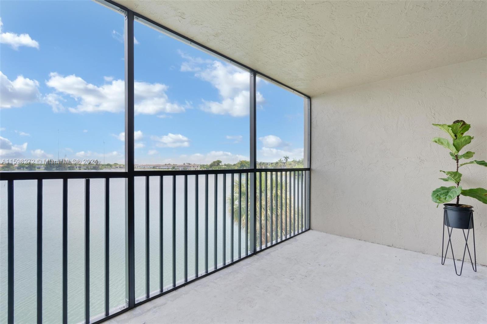 605 Ives Dairy Road, Unit 3047 Miami, FL 33179 - Photo 12 of 39 a view of a porch