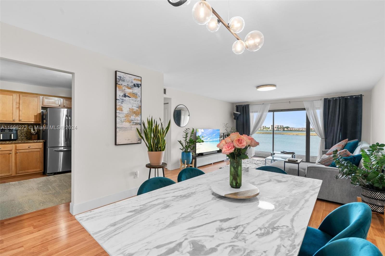 605 Ives Dairy Road, Unit 3047 Miami, FL 33179 - Photo 8 of 39 a view of a living room and dining room