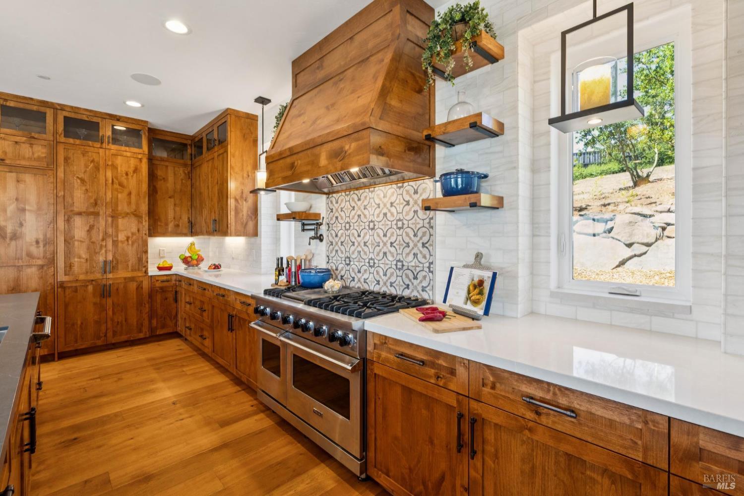 3882 Royal Manor Place Santa Rosa, CA 95404 - Photo 25 of 98 Organization made easy and stylish with these pull out Knotty Alder cabinets.