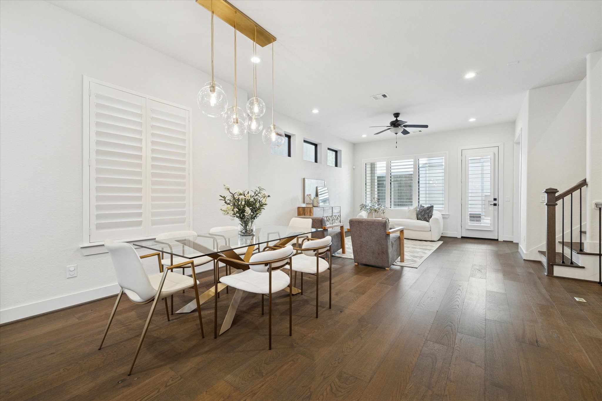 1122 Thompson Street Houston, TX 77007 - Photo 9 of 25 a view of a dining room with furniture and wooden floor