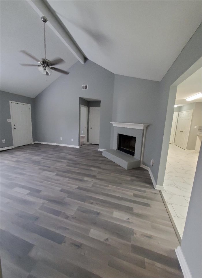 6748 State Line Road Memphis, TN 38141 - Photo 2 of 14 a view of a livingroom with a fireplace