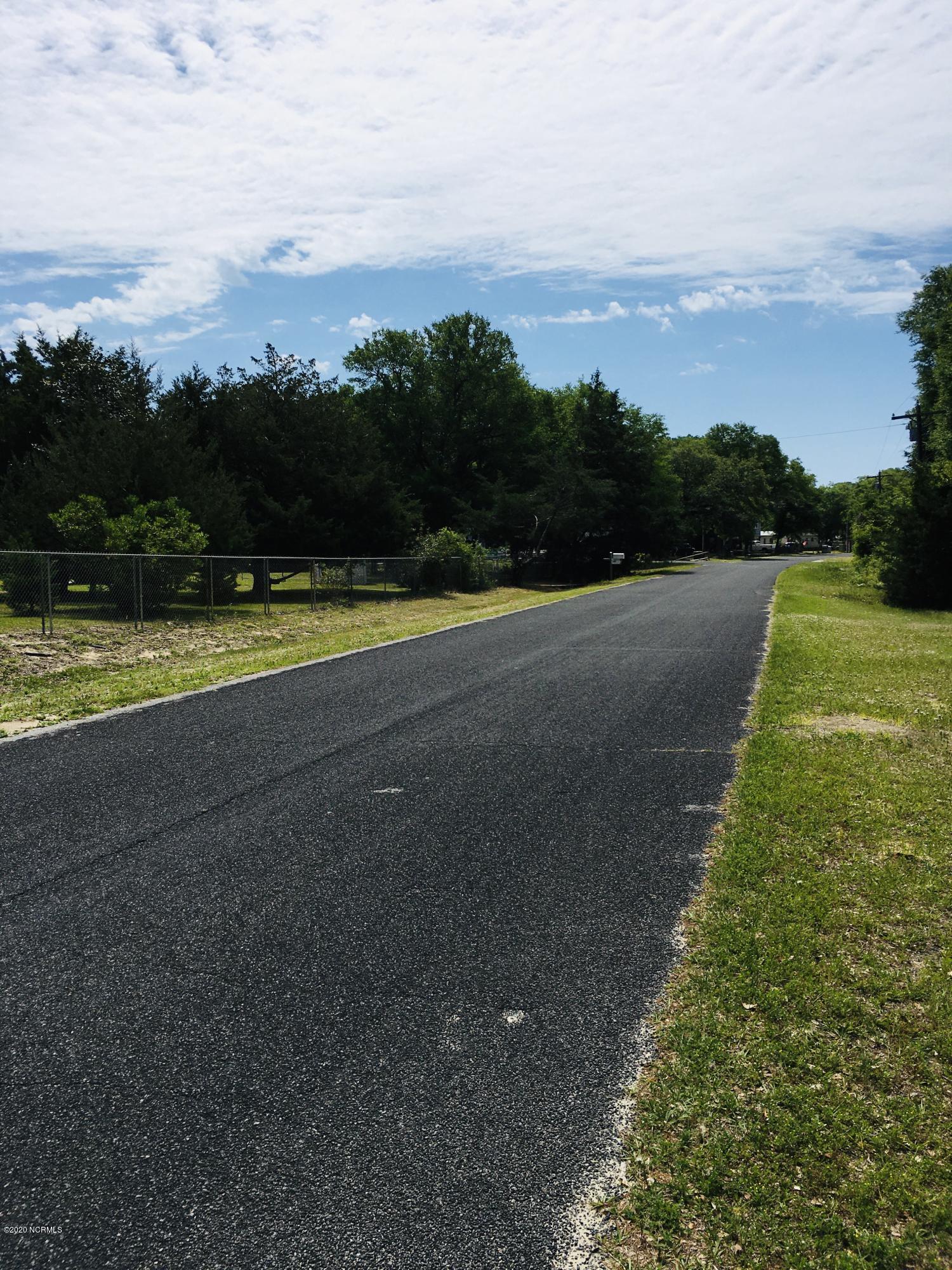 Maintained public road frontage! Just a little under a mile to the sandy shores of Holden Beach NC!
