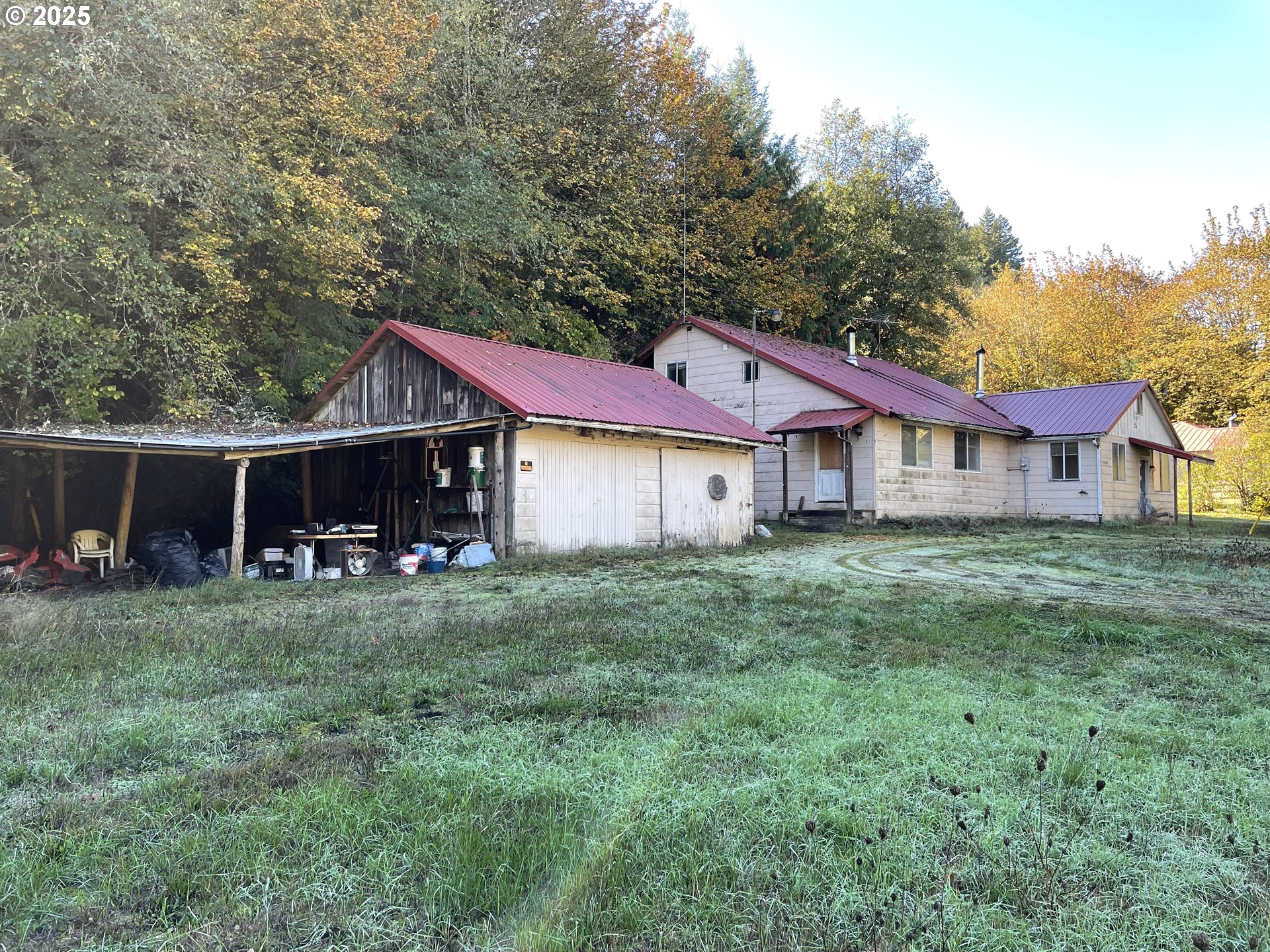 39688 Row River Road Dorena, OR 97434 - Photo 3 of 7 a view of a house with a yard