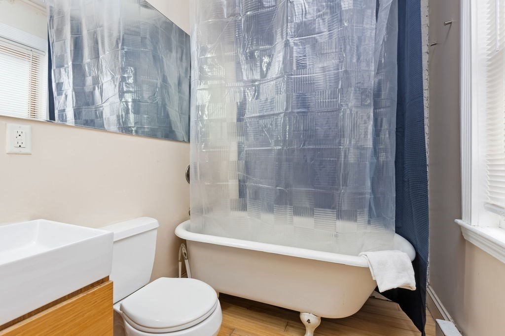 0 Hull Street, Unit F Boston, MA 02113 - Photo 11 of 14 a bathroom with a sink toilet and bathtub