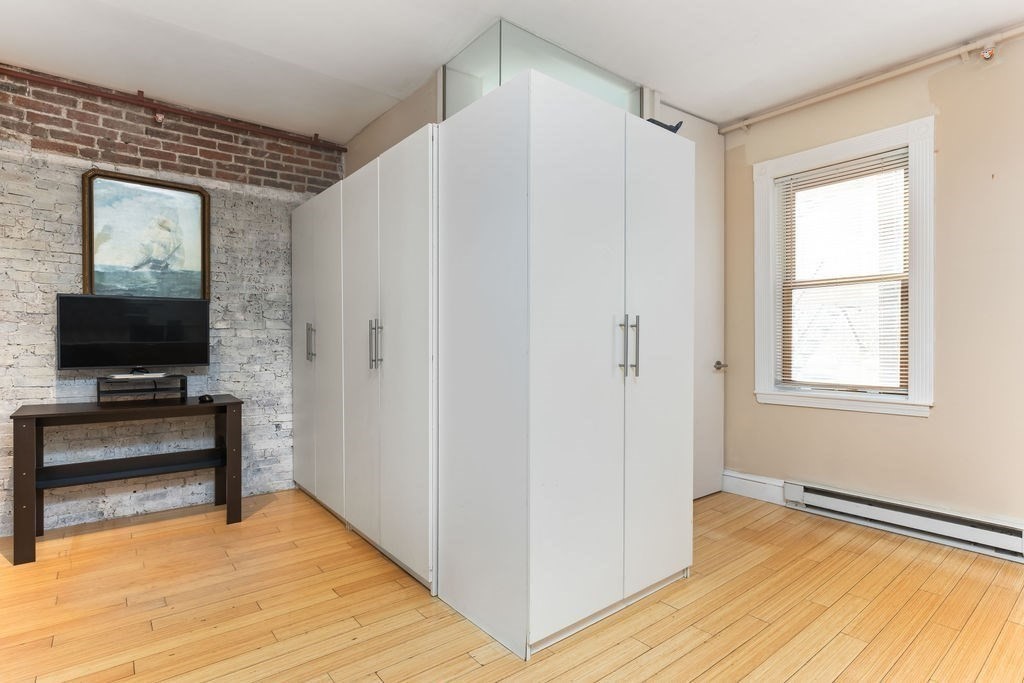 0 Hull Street, Unit F Boston, MA 02113 - Photo 14 of 14 a view of a livingroom with furniture