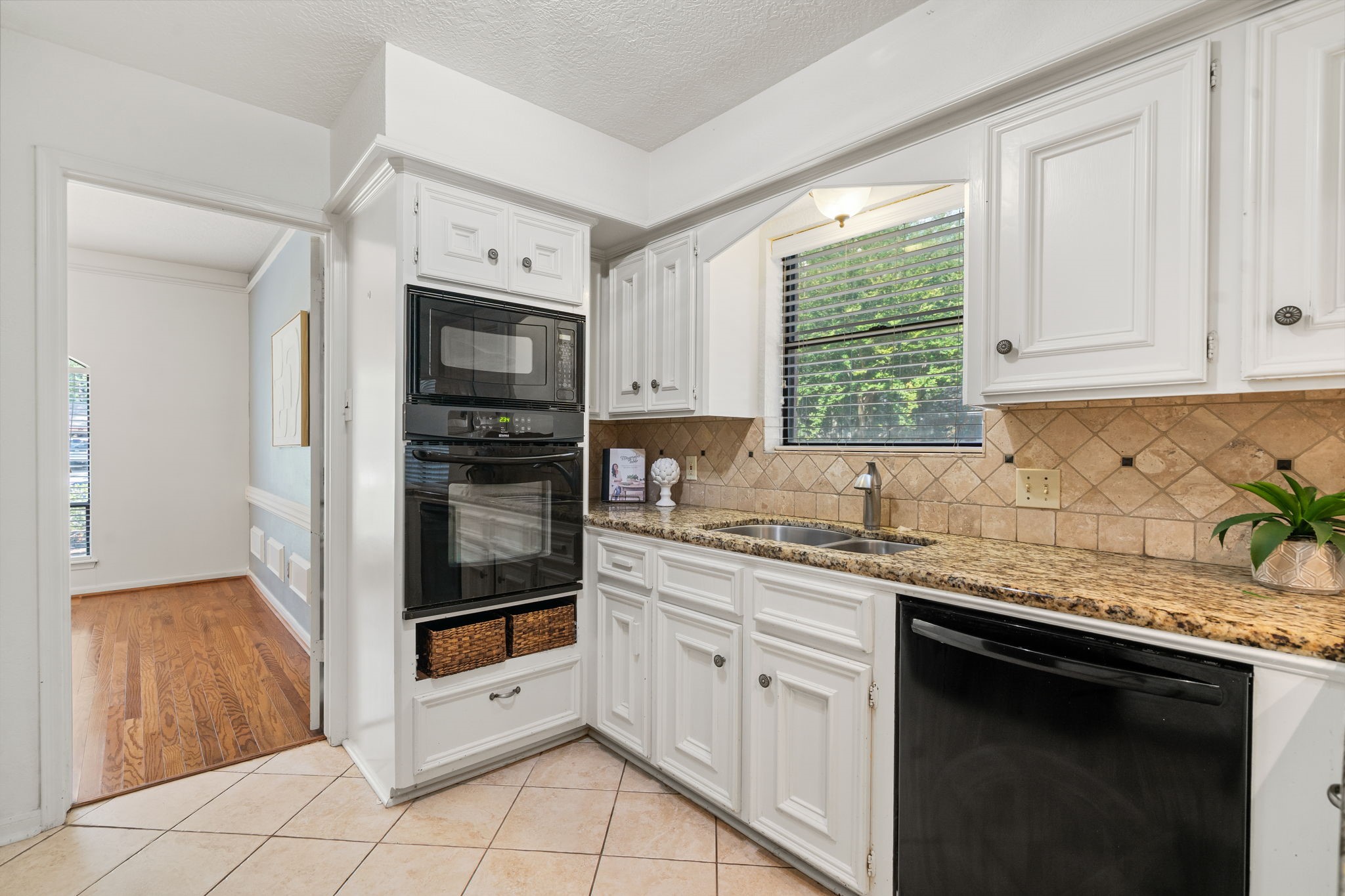 6403 Willow Pine Drive Spring, TX 77379 - Photo 15 of 40 Enjoy the natural light and the great view of the outdoors while prepping at this spacious sink.
