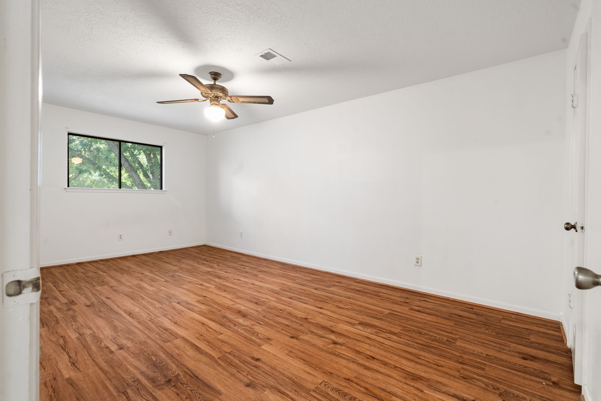 6403 Willow Pine Drive Spring, TX 77379 - Photo 28 of 40 This bright upstairs room offers plenty of space and features beautiful wood floors.