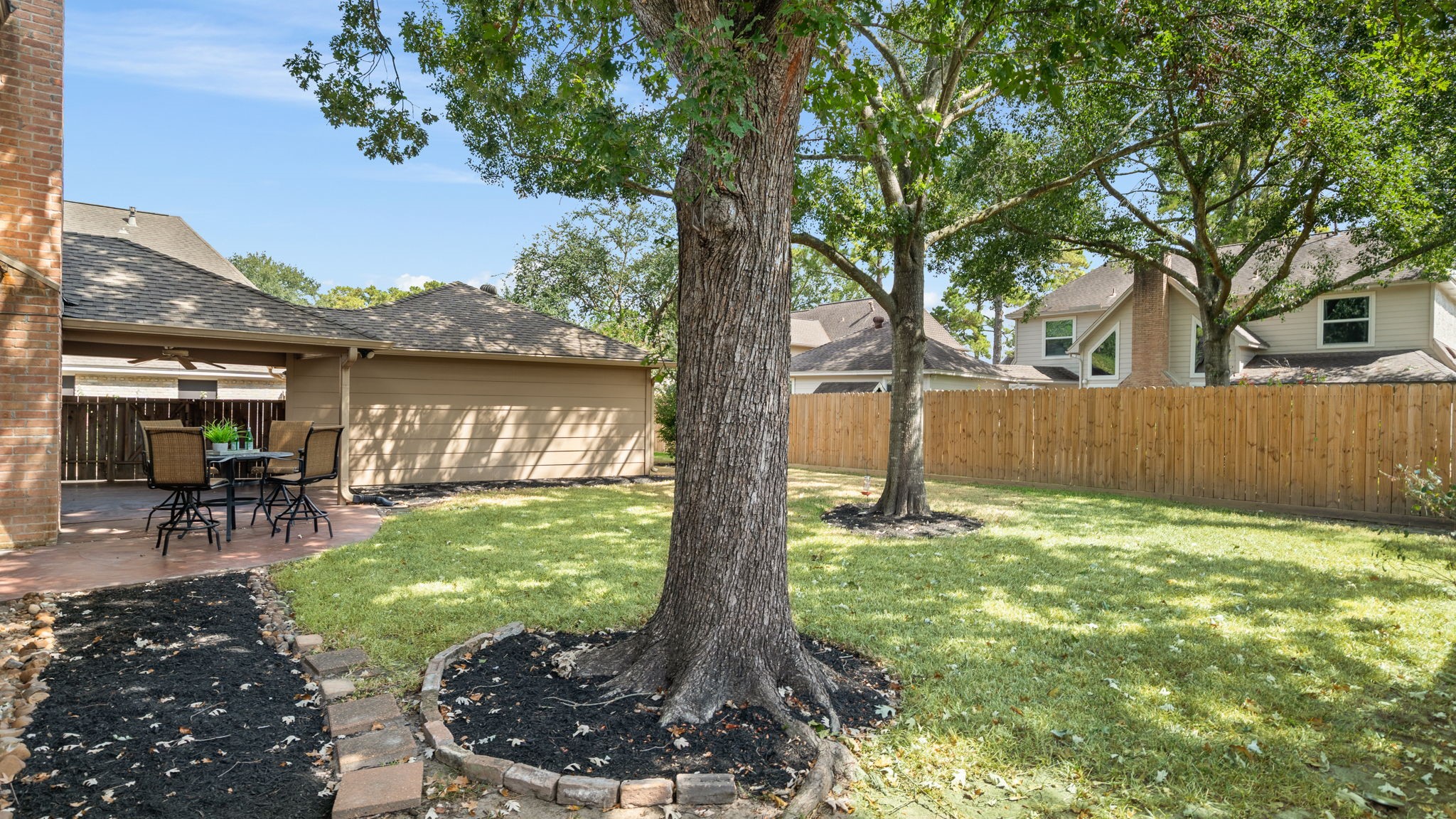6403 Willow Pine Drive Spring, TX 77379 - Photo 34 of 40 Your private escape! The large backyard and its established mature trees offer a serene, shady setting.