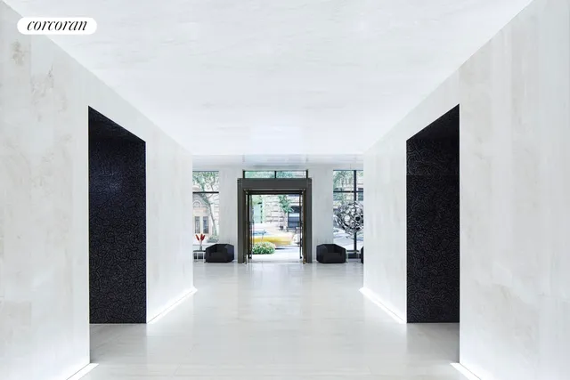 a view of living room with furniture and a window