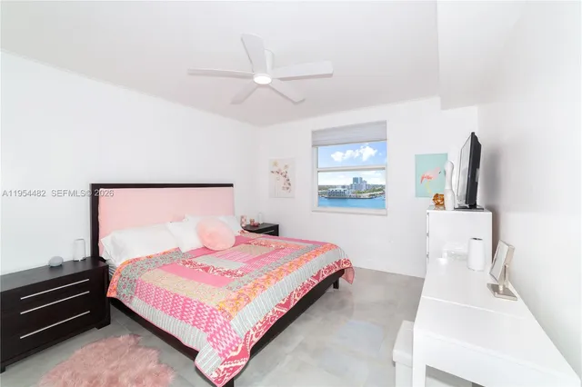 a bathroom with a sink mirror toilet and vanity