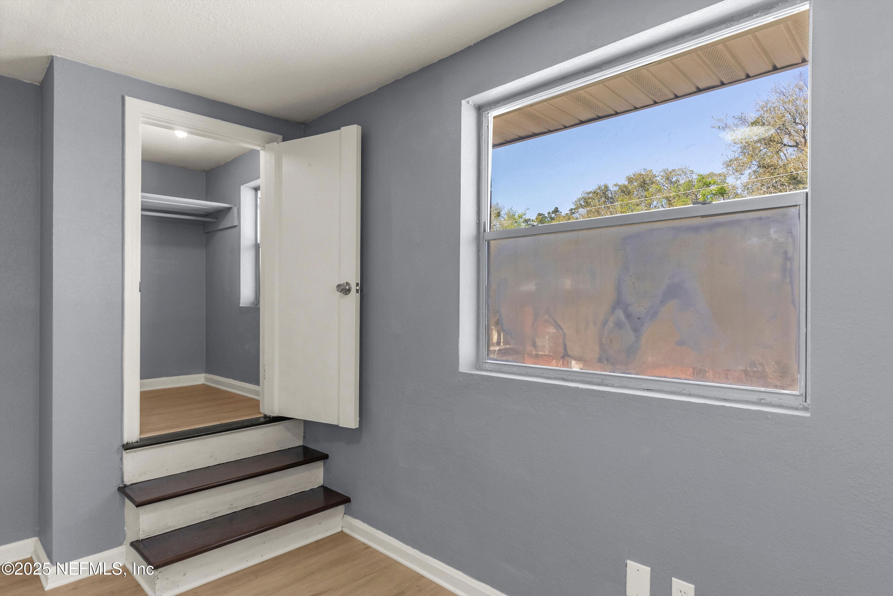 3150 Belden Circle Jacksonville, FL 32207 - Photo 23 of 69 a view of front door with a bench